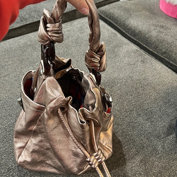 Coach Handbags - Metallic pink leather Coach bag used one day